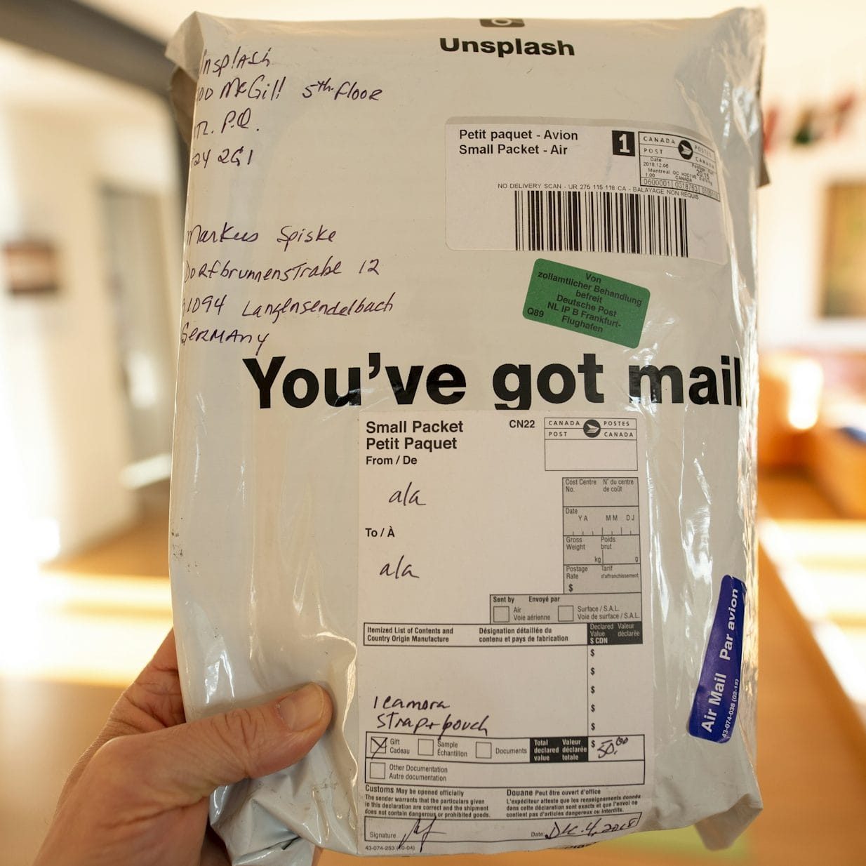 Courier collecting lost items from St Pancras Eurostar station for delivery to USA and Europe